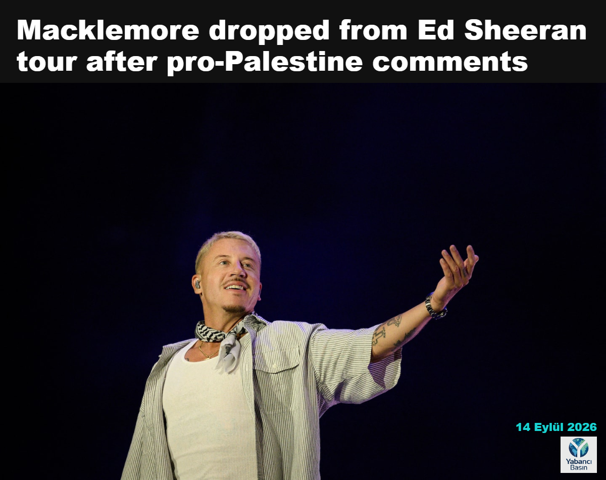 Macklemore Fransa’da sahne alıyor. (Arnaud Finistre/AFP/Getty Images)