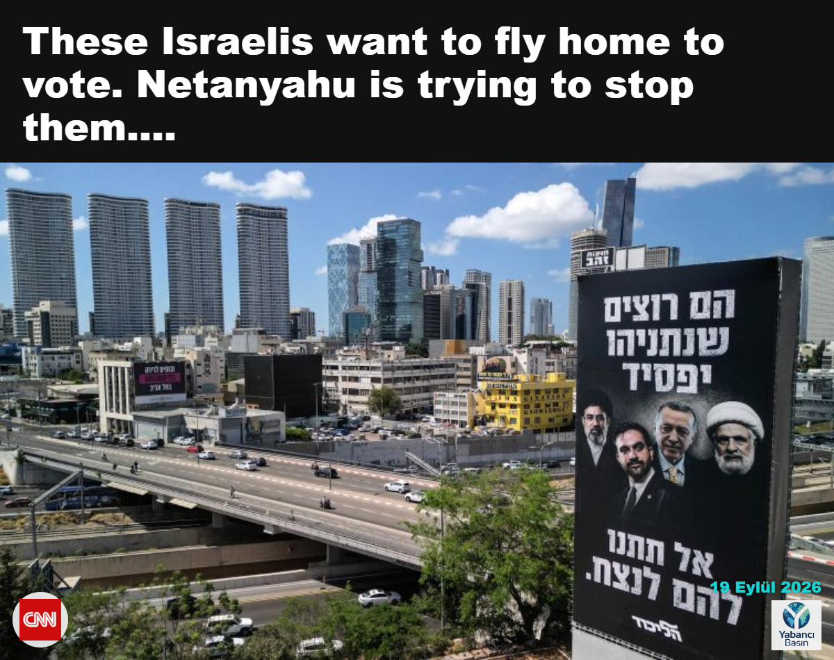 İsrail’in Tel Aviv kentinde Likud partisine ait bir seçim afişi ve şehir manzarası.